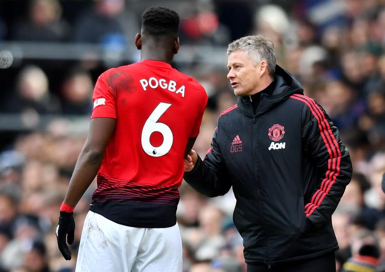 Med sine 8 mål i de 11 kampe har Paul Pogba (tv.) været en medvirkende årsag til, at Ole Gunnar Solskjær (th.) endnu ikke har tabt som United-manager.
   Foto: Dylan Martinez/Ritzau Scanpix