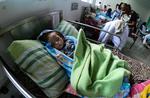 En underernæret baby ligger på hospitalet i byen Maracay. Der er udbredt mangel på mad i Venezuela. Foto: Yuri Cortez/Ritzau Scanpix
