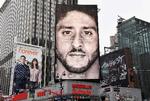 I september 2018 bragte Nike en reklame med Kaepernick, hvor der over hans ansigt stod: 'Tro på noget. Også selv om du må ofre alt'. Foto: Angela Weiss/Ritzau Scanpix