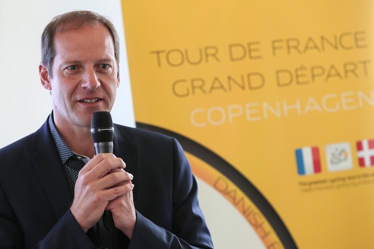 Danmark har bejlet til Christian Prudhomme og Tour de France i tre år. Nu er belønningen der.  Foto: Kamil Zihnioglu/Ritzau Scanpix