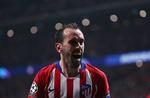 Altéticos store forsvarschef Diego Godin 
skriger sin glæde ud efter at have scoret til slutresultatet 2-0 i Madrid onsdag aften. Foto: Sergio Perez/Ritzau Scanpix
