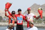 Aleksey Lutsenko hyldes som vinder af Tour of Oman for andet år i træk flankeret af Domenico Pozzovivo (t.v.) og Jesus Herrada.
 Foto: Anne-christine Poujoulat/Ritzau Scanpix