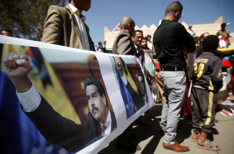 Det er, som om Venezuelas ulykkelige krise er blevet et surrealistisk skuespil, skriver Anne m. Sørensen.
   Foto: Mohaed Al-sayaghi/Ritzau Scanpix