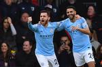 Matchvinder Riyad Mahrez (th.) jubler lørdag med holdkammerat Bernardo Silva på Vitality Stadium i Bournemouth.
   Foto: Dylan Martinez/Ritzau Scanpix