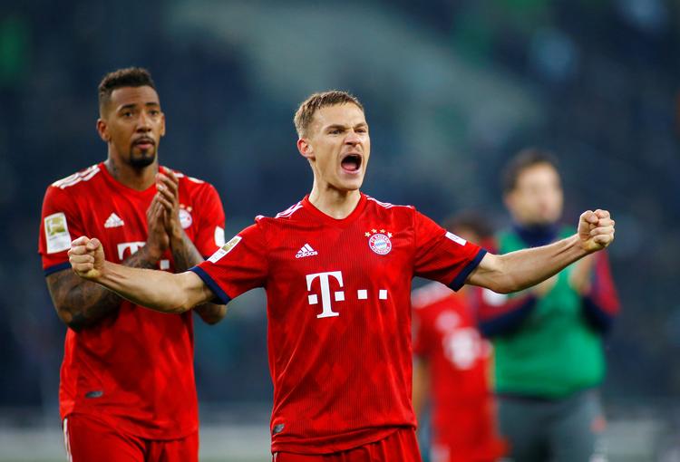 Bayern Münchens Joshua Kimmich jubler efter sejren.  Foto: Thilo Schmuelgen/Ritzau Scanpix