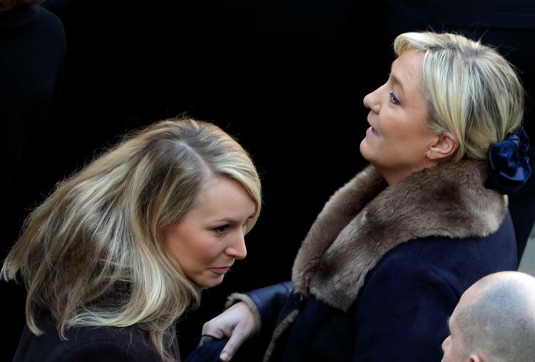 Marine Le Pen (th.) og Marion Maréchal er tante og niece. Men de repræsenterer to forskellige linjer i deres parti: den sociale og den liberalistiske.
   Foto: Philippe Wojazer/Ritzau Scanpix