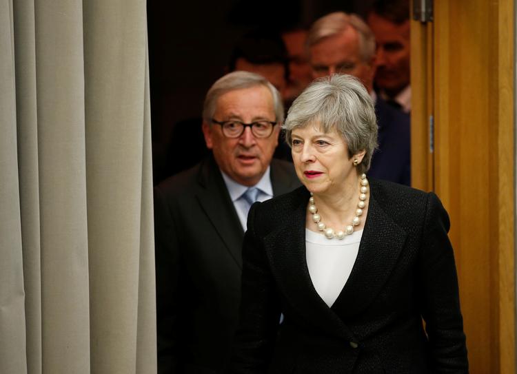 Storbritanniens premierminister, Theresa May, og EU-Kommissionens formand, Jean-Claude Juncker, ved aftenens pressemøde i Bruxelles.  Foto: Vincent Kessler/Ritzau Scanpix