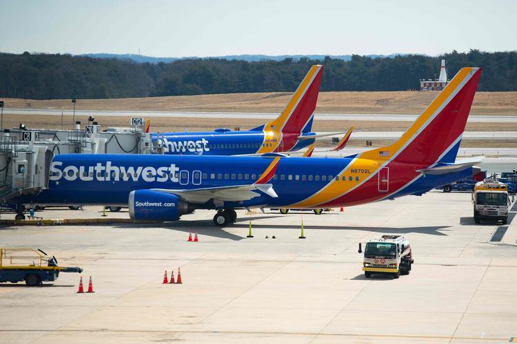 
   En Boeing 737 Max 8 fløjet af Southwest Airlines holder ved gaten i Baltimore Washington International Airport  Foto: Jim Watson/Ritzau Scanpix