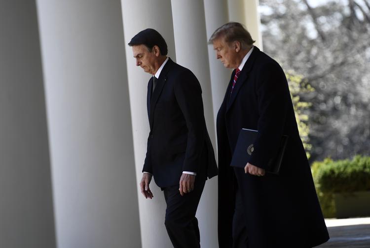 USA's præsident Donald Trump har siger af brasilianske kollega, Jair Bolsonaro. Foto: Brendan Smialowski/Ritzau Scanpix