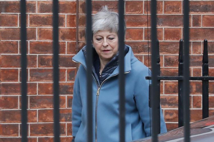 
Theresa May forlader sin embedsbolig på vej til Bruxelles. Foto: Tolga Akmen/Ritzau Scanpix