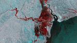 Satellitbilledet viser omfanget af oversvømmelser, afbildet i rødt, omkring havnebyen Beira i Mozambique den 19. marts. (Foto: European Space Agenc 