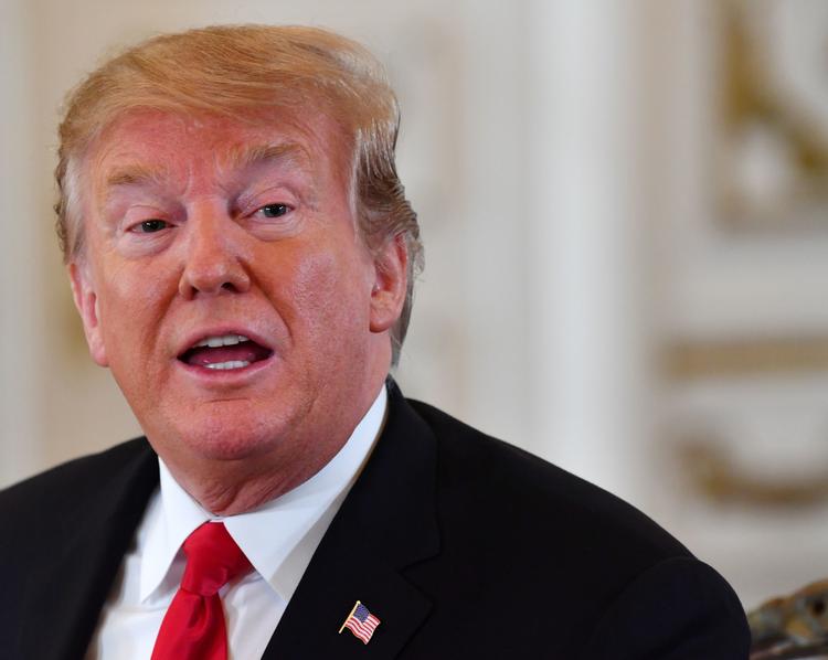 Rapporten er god for Donald Trump, med mindre der kommer ubehagelige detaljer frem, når og hvis andre end justitsministeren får lov at læse hele rapporten. Foto: Nicholas Kamm/Ritzau Scanpix