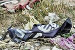 En efterladt Islamisk Stat-fane ligger på jorden efter Barghuz' fald som terrorgruppens sidste tilholdssted. Foto: Giuseppe Cacace/Ritzau Scanpix