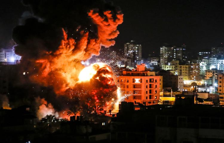 Israelerne har blandt andet bombet hovedkvarteret for Hamas' leder i Gaza efter raketangrebene fra den palæstinensiske side. Foto: Mahmud Hams/Ritzau Scanpix