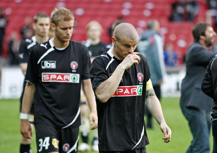 I fire forsøg har FC Midtjylland ikke formået at vinde pokalfinalen. Her Christian Sivebæk og Mikkel Thygesen efter et af de to nederlag mod FC Nordsjælland. Foto: Jens Dresling/POLFOTO