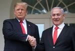 Israels premierminister, Benjamin Netanyahu, vil opkalde en bosættelse i de besatte Golan-højder som et udtryk for, at Israel sætter pris på Trumps anerkendelse af området som israelsk. Foto: Leah Millis/Ritzau Scanpix