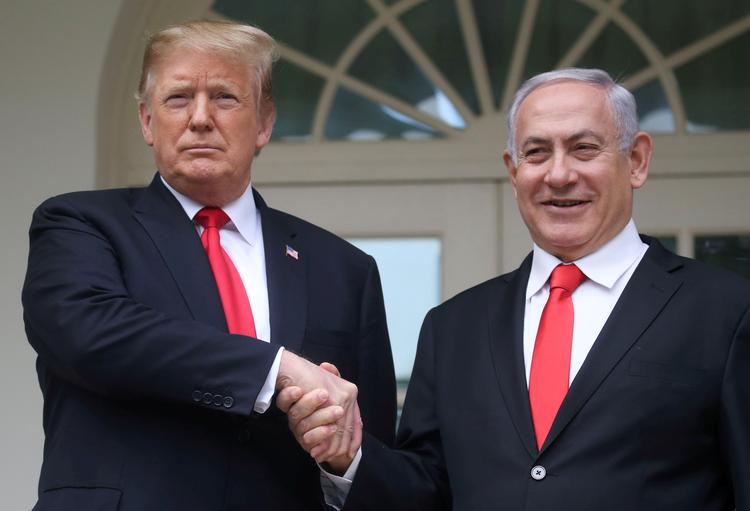 Israels premierminister, Benjamin Netanyahu, vil opkalde en bosættelse i de besatte Golan-højder som et udtryk for, at Israel sætter pris på Trumps anerkendelse af området som israelsk. Foto: Leah Millis/Ritzau Scanpix