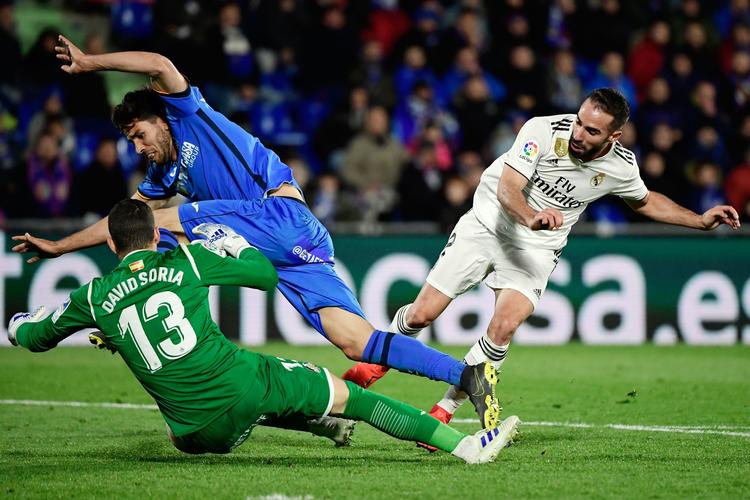 Med fire runder tilbage i den spanske Primera Division bliver den lille klub Getafe ved med at imponere.
Getafe har ikke tabt i ligaen siden 30. marts, og sent torsdag formåede holdet at spille 0-0 hjemme mod storebror Real Madrid. (Photo by JAVIER SORIANO / AFP)
   Foto: Javier Soriano/Ritzau Scanpix