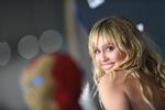Sangerinden Miley Cyrus er blandt hovednavnene til 50-års jubilæet for Woodstockfestivalen.  Foto: Valerie Macon/Ritzau Scanpix