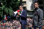 Den selvudnævnte præsident Juan Guaido taler til sine tilhængere sammen med Leopoldo Lopez, der netop er løsladt fra husarrest. Guido hævdede, at militæret nu støttede hans kamp mod den siddende præsident Maduro. Men det viste sig ikke at holde stik. Lopez har nu søgt asyl på den spanske ambassade.  Foto: Cristian Hernandez/Ritzau Scanpix