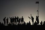 Uden for militærets hovedkvarter i Sudans hovedstad Khartoum bliver der dagligt demonstreret for at få militærjuntaen til at slippe grebet om landet.  Foto: Ozan Kose/Ritzau Scanpix