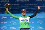 Kasper Asgreen på podiet iført den grønne førertrøje i pointkonkurrencen. Foto: Getty Images. 