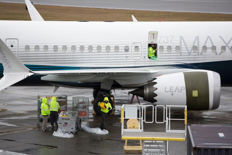 Arbejdere står ved Boeing 737 Max-fly i Washington. Arkivfoto. Foto: Jason Redmond/Ritzau Scanpix