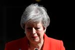 En grådkvalt Theresa May fortæller, at hun vil forlade posten som Storbritanniens premierminister.  Foto: Toby Melville/Ritzau Scanpix