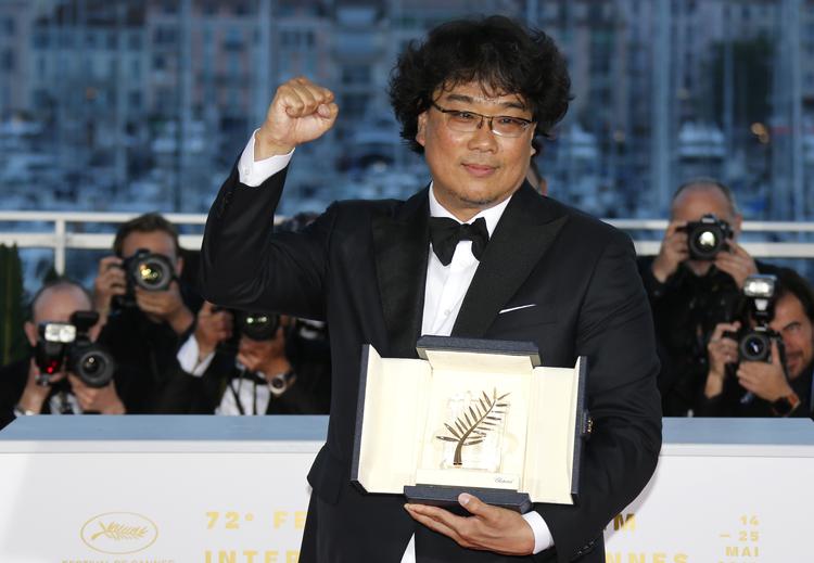 Guldpalmen gik til den koreanske film ’Gisaengchung’ (’Parasite’) og dens instruktør Bong Joon-ho. Foto: Jean-paul Pelissier/Ritzau Scanpix