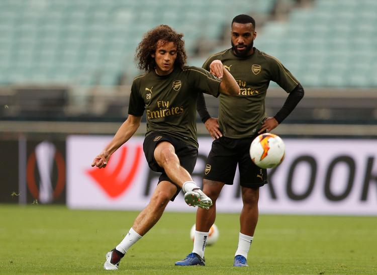 Arsenals Matteo Guendouzi (tv.) og Alexandre Lacazette i aktion ved den afsluttende træning på det olympiske stadion i Baku. Foto: Amr Abdallah Dalsh/Ritzau Scanpix