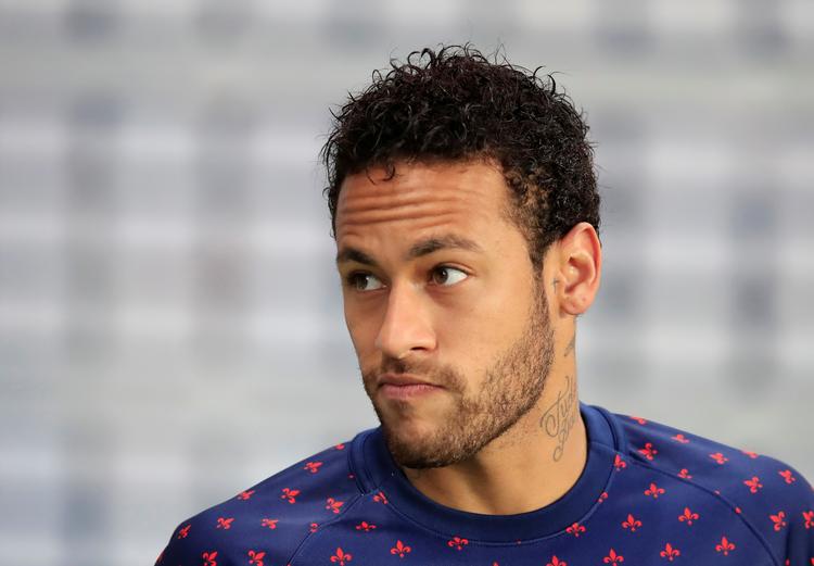 Neymar skaber ikke kun overskrifter for sit fodboldspil - han anklages for it-kriminalitet og for voldtægt.  Foto: Gonzalo Fuentes/Ritzau Scanpix