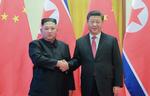 Xi Jinping og Kim Jong-un mødtes tidligere i år, hvor sidstnævnte besøgte Kina.  Foto: Kcna Via Kns/Ritzau Scanpix