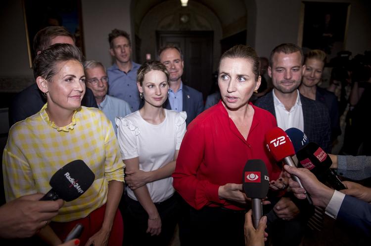 Mette Frederiksen fra Socialdemokratiet, Pia Olsen Dyhr fra SF, Pernille Skipper fra Enhedslisten og Morten Østergaard fra Radikale efter de afsluttede regeringsforhandlinger i Landstingssalen på Christiansborg, tirsdag 25. juni 2019. Foto: Mads Claus Rasmussen/Ritzau Scanpix. Foto: Mads Claus Rasmussen/Ritzau Scanpix