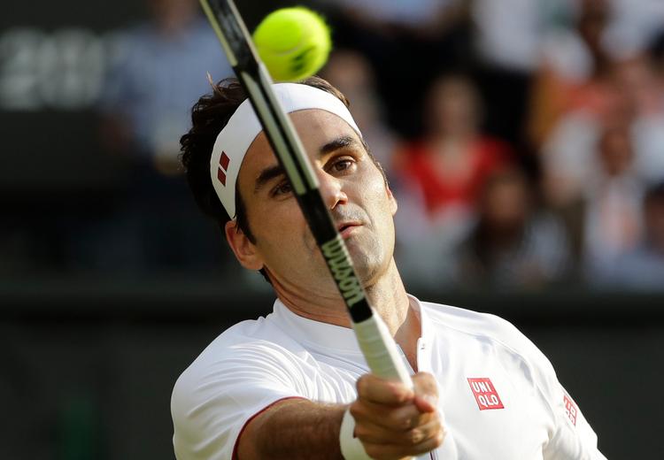 I sin 21. Wimbledon-kampagne er Roger Federer, der har løftet trofæet otte gange, atter blandt de mest åbenlyse favoritter til titlen.   Foto: Ben Curtis/Ritzau Scanpix