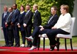 Da Danmarks statsminister, Mette Frederiksen, kom til Berlin, sad de to regeringschefer ned,  mens den tyske og danske nationalmelodi blev afspillet. Foto: Hannibal Hanschke/Ritzau Scanpix