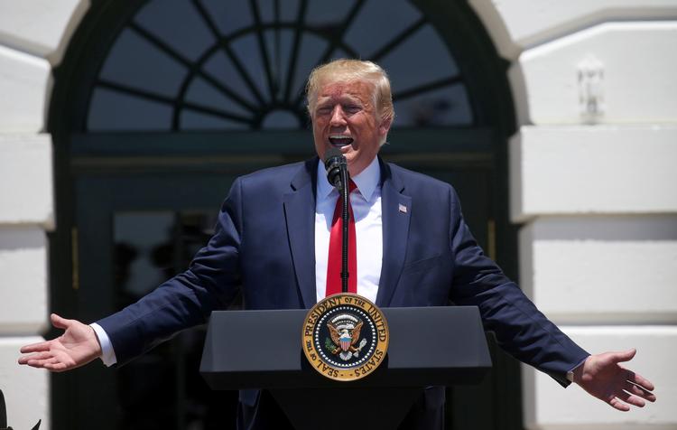 Præsident Trump fortsætter angrebet mod fire unavngivne, kvindelige demokrater.  Trump beskylder de fire demokratiske kongresmedlemmer for at 'elske' USA's 'fjender såsom al-Qaeda'. Foto: Leah Millis/Ritzau Scanpix