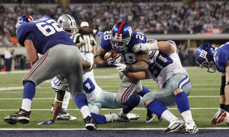 Mitch Petrus (til ventre med nr. 62 på ryggen) havde en kort NFL-karriere, men nåede at vinde Super Bowl. Foto: Mike Stone/Ritzau Scanpix