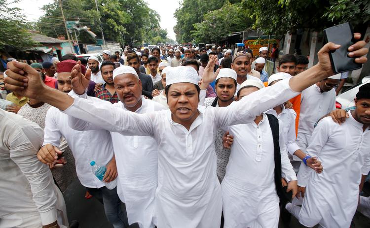 
   Muslimer demonstrerede i juni i Kolkata deres protest mod en flok ophidsede hinduisters lynchning af en trosfælle,
   Foto: Rupak De Chowdhuri/Ritzau Scanpix