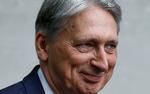 Philip Hammond trådte tilbage fra sin post, da Johnson var blevet valgt som ny partileder og premierminister. Foto: Henry Nicholls/Ritzau Scanpix