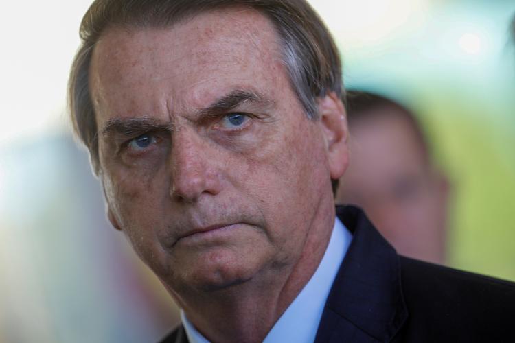 Brasiliens præsident Jair Bolsonaro kritiseres for den måde, han har håndteret brandene i Amazonas på. 
 Foto: Adriano Machado/Ritzau Scanpix