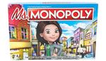 Ms. Monopoly er en Silicon-Valley type, der har blazer på uden på en T-shirt, hvor der står 'GO'. En smart kvinde med fart over feltet.  