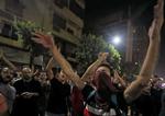 »Gå af Sisi!«, lød et af slagordene fra demonstranterne i Egypten. Foto: Mohamed Abd El Ghany/Ritzau Scanpix