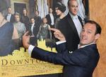 Den engelske skuespiller Harry Hadden-Paton ses her foran plakaten til 'Downton Abbey'-filmen, hvor han spiller rollen som Bertie Hexham. Foto: Angela Weiss/Ritzau Scanpix