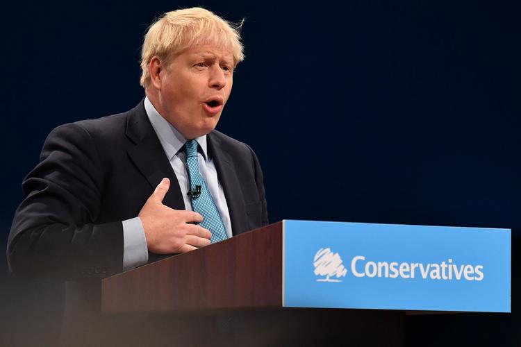 Storbritannien er ude af EU 31. oktober, siger premierminister Boris Johnson på det konservative landsmøde. Hvilken aftale Johnson tilbyder EU, er dog uklar.  Foto: Ben Stansall/Ritzau Scanpix