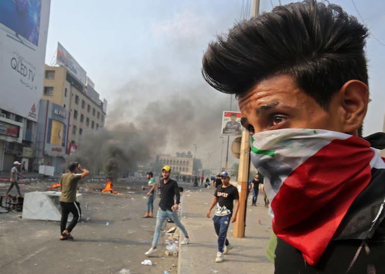 Demonstranter har været på gaden i Irak for at protestere over blandt andet påstået magtmisbrug, korruption og høj arbejdsløshed i landet. Foto: Ahmad Al-rubaye/Ritzau Scanpix