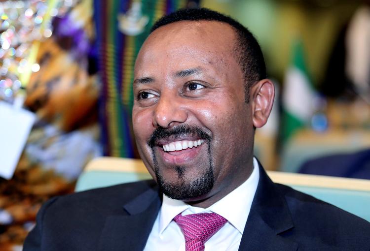 
  Etiopiens leder blev fredag hyldet for at skabe fred med naboen Eritrea. Han lover desuden demokrati og grøn omstilling. Men reformerne er ikke nogen ubetinget succes. 
   Foto: Tiksa Negeri/Ritzau Scanpix