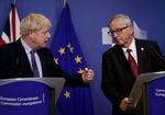 Premierminister Boris Johnson og EU-Kommissionsformand, Jean-Claude Juncker. Foto: Kenzo Tribouillard/Ritzau Scanpix