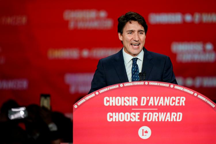 Lederen af det liberale parti og Canadas premierminister Justin Trudeau vinder valget.  Foto: Carlo Allegri/Ritzau Scanpix