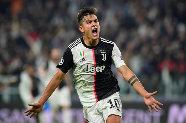 To hug med venstrebenet fra Paulo Dybala sikrede Juventus en 2-1-sejr i Champions League.  Foto: Massimo Pinca/Ritzau Scanpix
