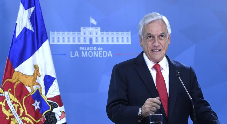  Sebastian Piñera taler til den chilenske befolkning. 
  
   Foto: Ho/Ritzau Scanpix